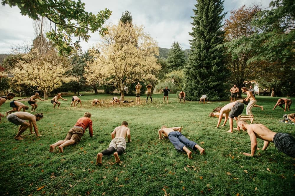 Men training together on the grass